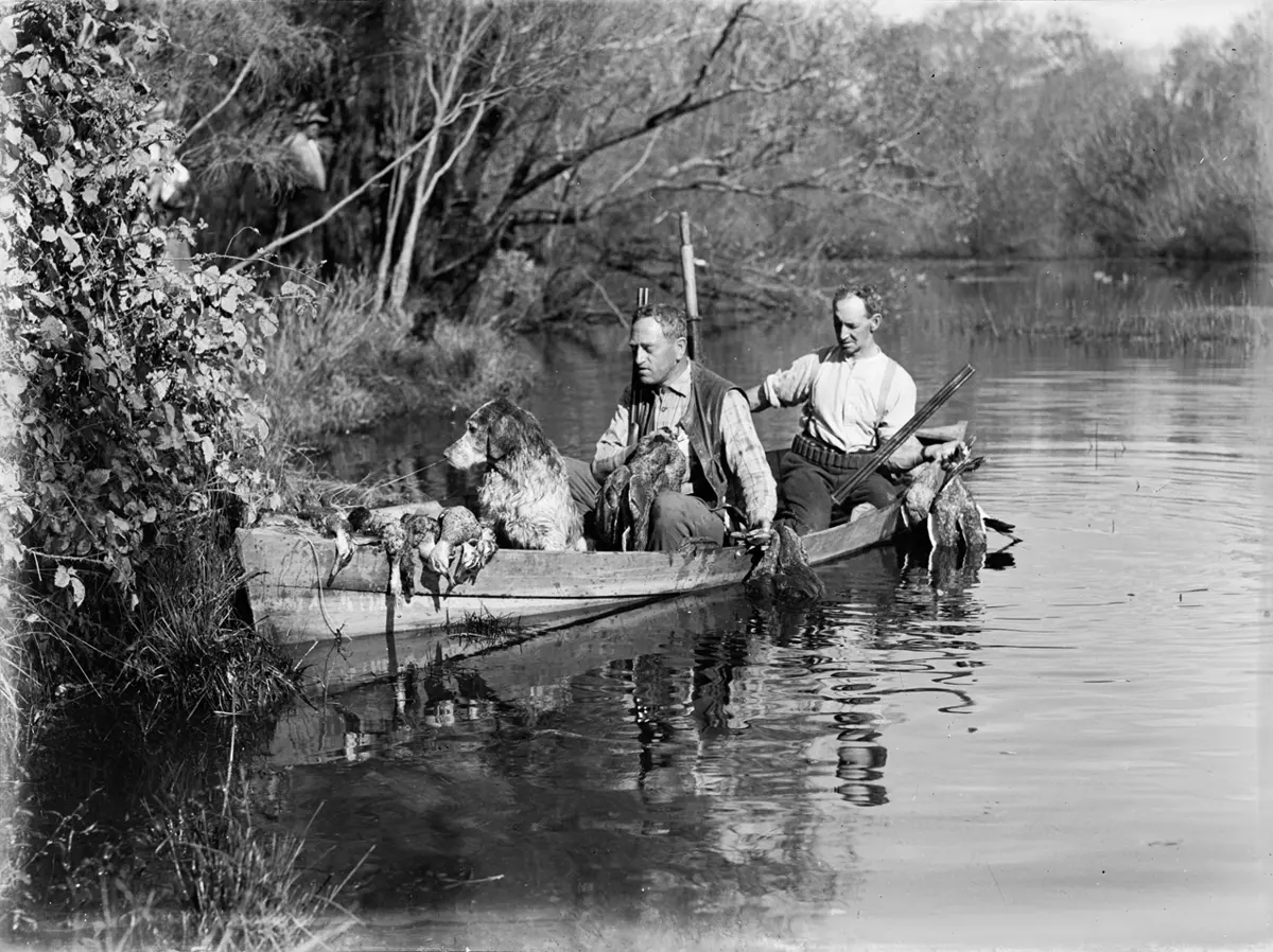 Historic photograph of duck hunting from a canoe