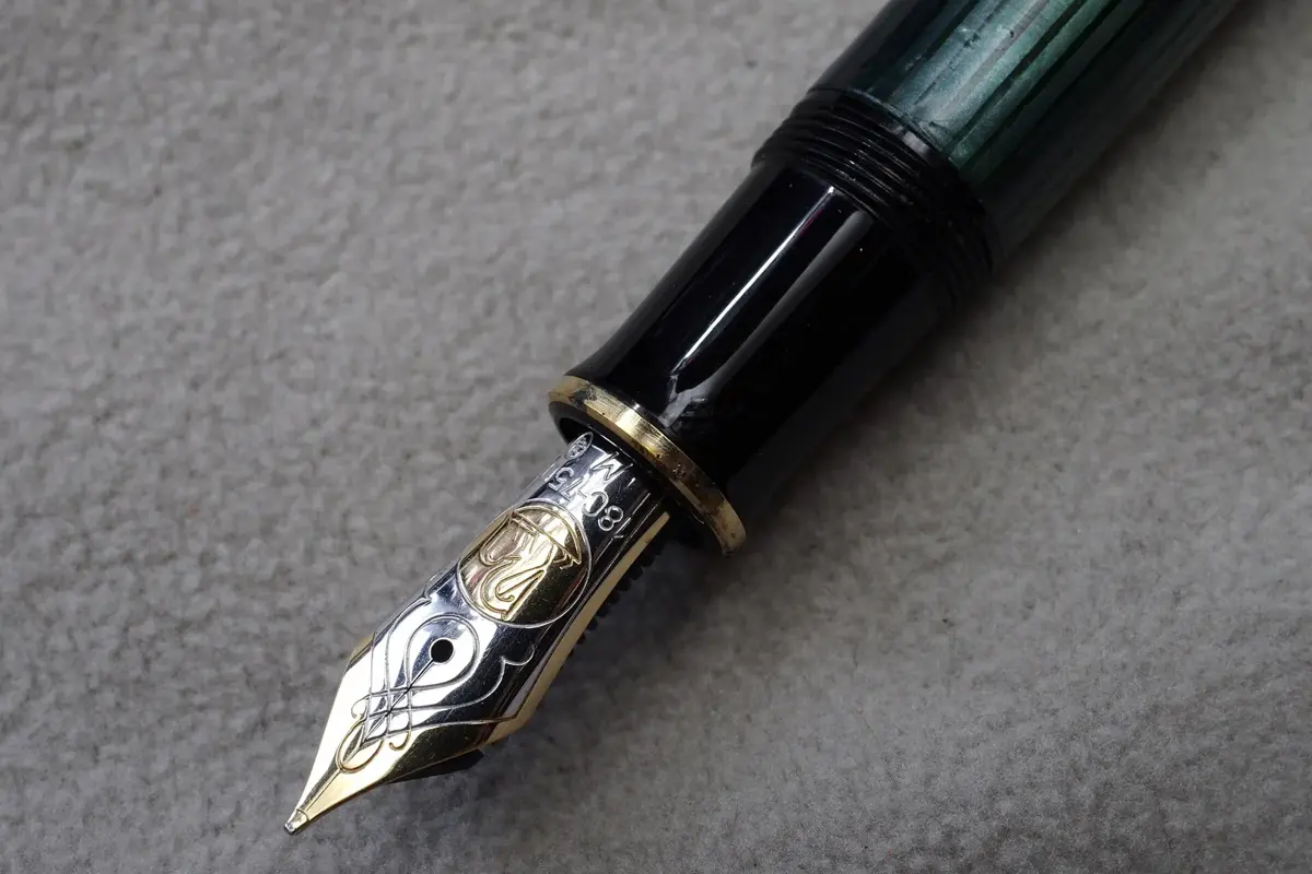 The two-tone gold nib of a Pelikan M800